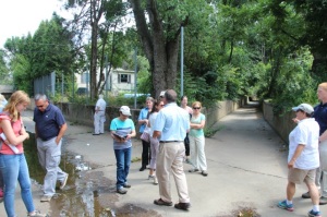 Tour group visits channelized section of Sandy Run, Abington Township
